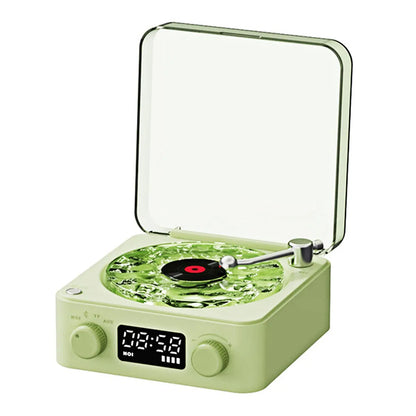 Green white noise speaker with a transparent cover on a white background